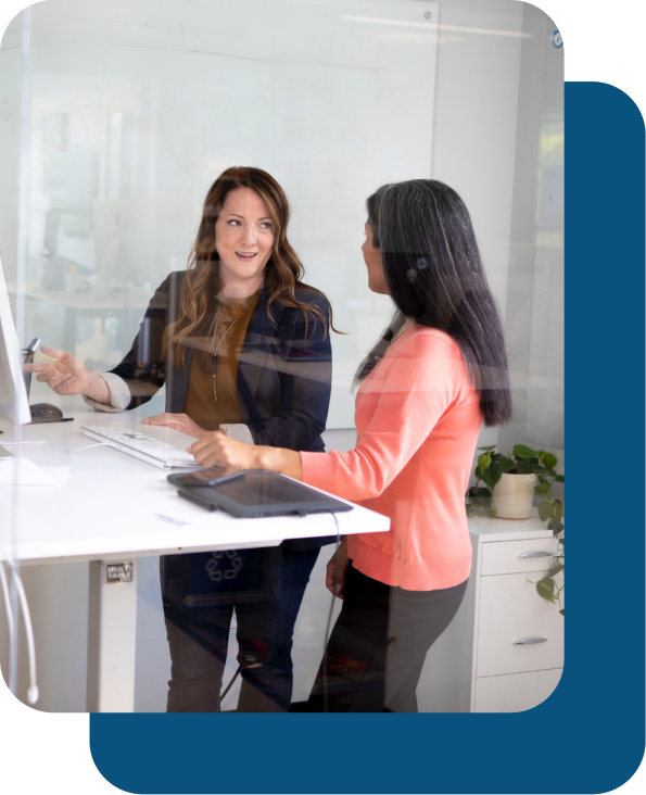 Two young ladies talk